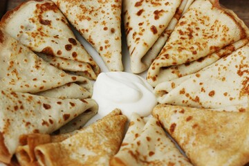 Delicious fresh crepe with sour cream macro