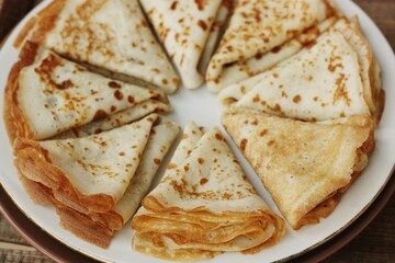 Delicious fresh crepe on the plate macro