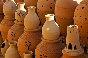 Fototapeta na wymiar Clay pots for sale in open-air market, Nizwa, Sultanate of Oman