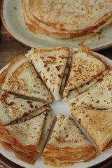 Delicious fresh crepe on the plate macro