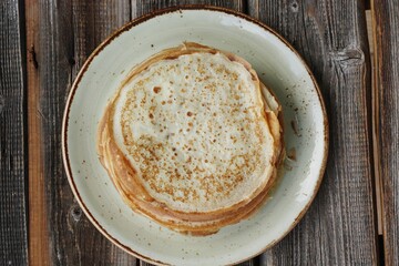 Delicious fresh crepe on the plate macro