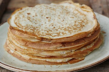 Delicious fresh crepe on the plate macro