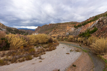 Darrical river passing between mountains