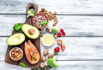 Healthy food choice, healthy eating concept for heart on wood background with copy space for your text.