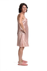 side view of summer nightgown on white background, hands on hip looking at camera