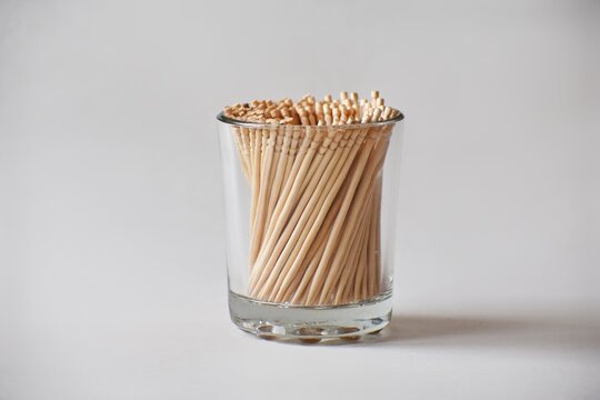 Stack of toothpicks in white