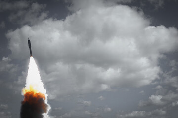 Fascinating rocket launch with dramatic clouds. The elements of this image furnished by NASA.