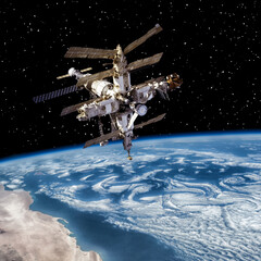 Space station above the earth. The elements of this image furnished by NASA. © wowinside