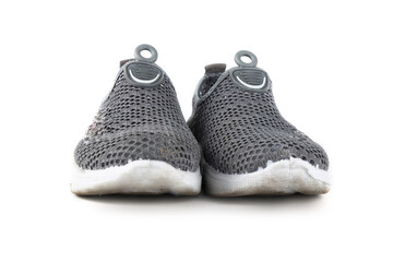 pair of gray sneakers isolated on white background. comfortable sports shoes. running, walking, comfortable shoes.