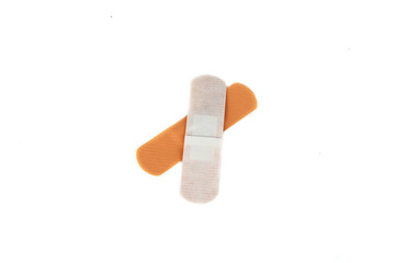 Adhesive plaster isolated on white background. Healing wounds, scratches, sadin.