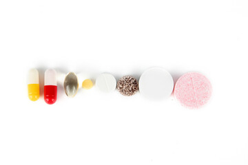 pills isolated on white background.Concept of treatment.Vitamins, pills.Pack packs for colds.