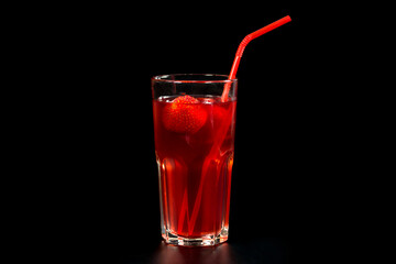 Fresh strawberry cocktail with strawberries on a black background. Fresh lemonade.