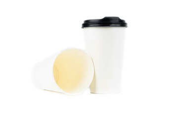 A row of paper coffee cups on a white background.Glasses for coffee and tea of different sizes isolated on white background. Hot coffee, starbucks.