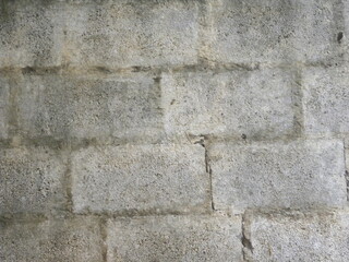 Gray rustic concrete brick wall textured background