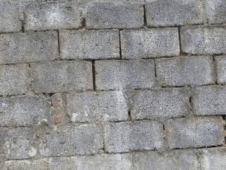 Gray rustic concrete brick wall textured background