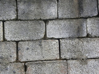 Gray rustic concrete brick wall textured background