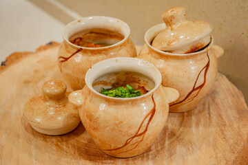 Recipe for baked meat with cheese and fresh vegetables in earthenware pots