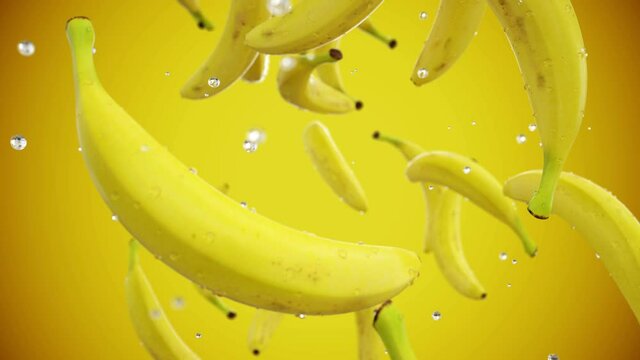 Fresh bananas falling with water drops. Slow motion. Realistic animation. Isolate with alpha channel