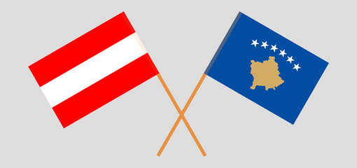 Crossed flags of Kosovo and Austria