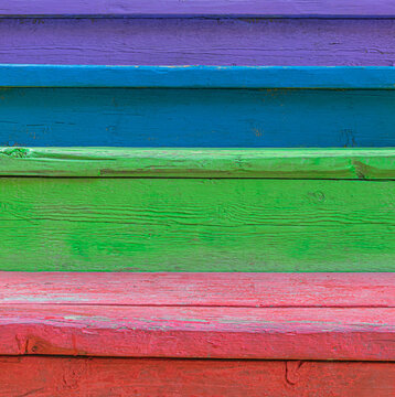 Close-up view of wooden staircases painted in different colors. Tbilisi, Georgia