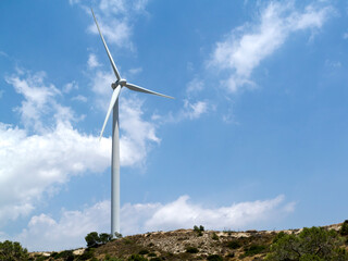 Fototapeta na wymiar Wind turbine tower on the hill 