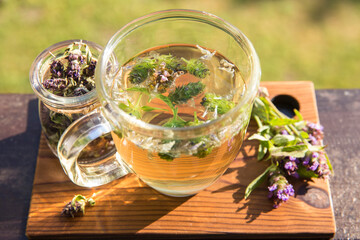 Prunella vulgaris (known as common self-heal, heal-all, woundwort, heart-of-the-earth, carpenter's herb, brownwort and blue curls herbal tea with dry and fresh herb.