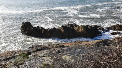 waves breaking on rocks