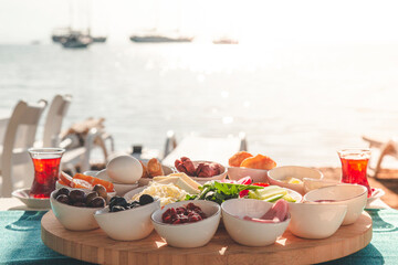 Turkish Breakfast view during sunrise by sea