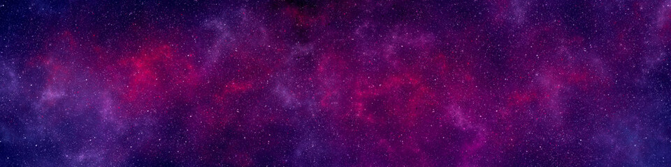 Nebula and stars in night sky web banner. Space background. © Nada Sertic