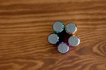 Colored bottles with rubber stoppers. The upper halves of the vials. Bottles for medicine and cosmetology