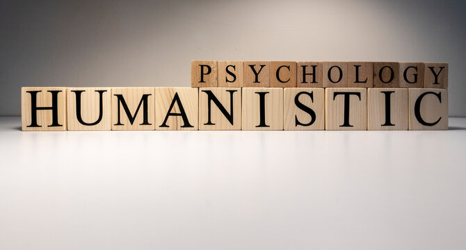 Humanistic psychology text from wooden cubes. The term psychology profession.