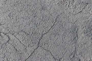 Texture of wet cracked ground as background