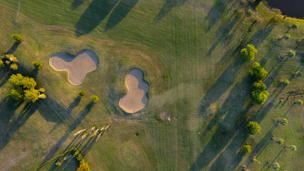 Drone view of a field with colorful trees and a beautiful surrounding nature