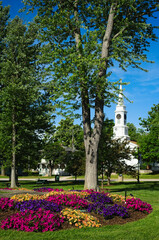 Flowers and historic church on township square in Twinsburg Ohio