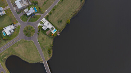 Drone view of a field with colorful trees and a beautiful surrounding nature