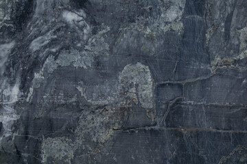Black and gray marble texture. White sprinkles. It can be used in interior design. It looks very expensive.