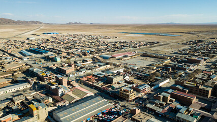 Aerial view of the city of Uyuni. City camouflaged in the salt desert in Bolivia