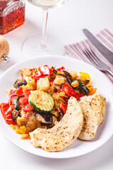 Grilled vegetables and fried chicken breast