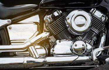 Motorcycle engine closeup background. Chromium details of  motorbike.