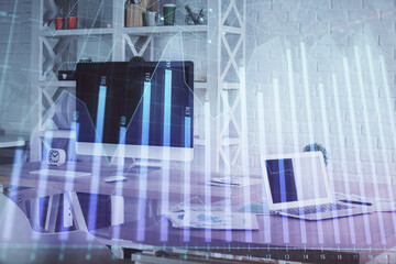 Double exposure of financial graph drawing and office interior background. Concept of stock market.