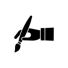 Artist black glyph icon. Freelance designer. Hand with paint brush. Creative work. Hobby and craft. Designer tool. Oil painting. Silhouette symbol on white space. Vector isolated illustration