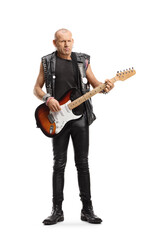 Full length portrait of a punk rocker with an electric guitar
