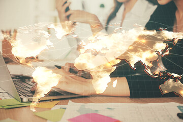 Multi exposure of woman hands typing on computer and business theme hologram drawing. Success concept.