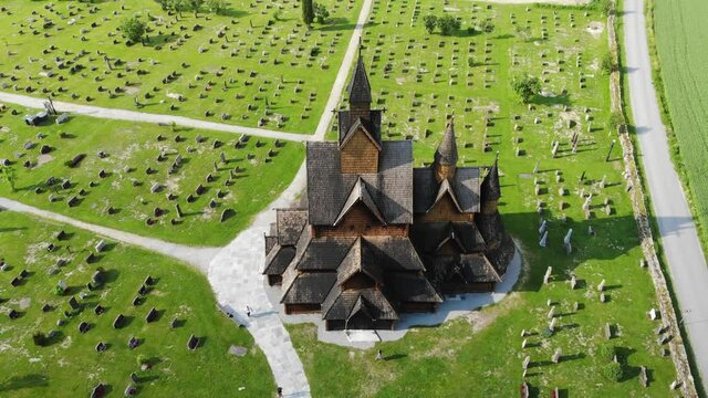 Norwegian traditional wooden church seen from above. Crane uplift