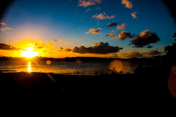 sunset, sky, sun, clouds, cloud, nature, landscape, evening, sunrise, light, orange, blue, sunlight, water, dawn, morning, dark, night, dusk, beach, lake, heaven