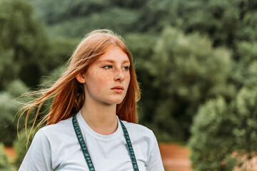 Portrait of young teen freckled ginger girl