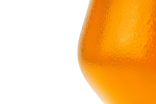 Half a glass of cold beer, drops of water on glass, space for text on the left, isolated on white with a clipping path.