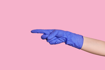 Number one. Hand in a medical glove counts on fingers. The hand is on the right