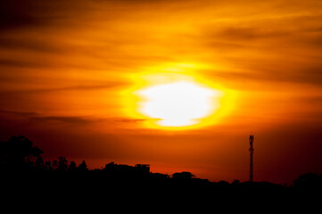 sunset, sky, city, clouds, sun, sunrise, orange, silhouette, landscape, evening, skyline, cloud, building, dusk, dawn, urban, red, nature, light, horizon, yellow, color, night, cityscape, town