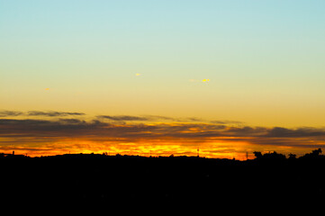 sunset, sky, sun, clouds, orange, nature, landscape, sunrise, evening, red, dusk, cloud, silhouette, mountain, sea, light, beautiful, yellow, morning, dawn, blue, color, view